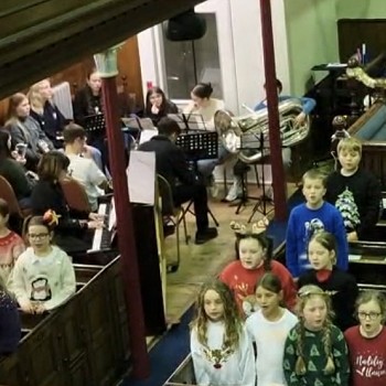 students singing in a performance