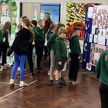 people having a look at what the children have made