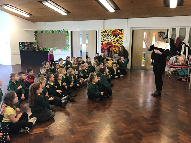 woman teaching the students about makaton