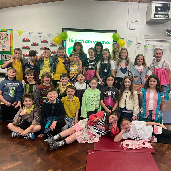 Children wearing colourful clothes for the fashion show