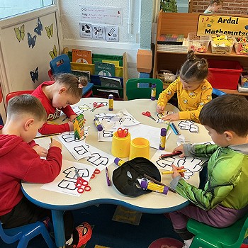 Children colouring in the classroom