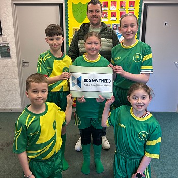 BDS Gwynedd with Ysgol y Gelli pupils in their new football kit