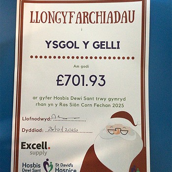A certificate from Dewi Sant's Hospice congratulating Ysgol Y Gelli for raising money.